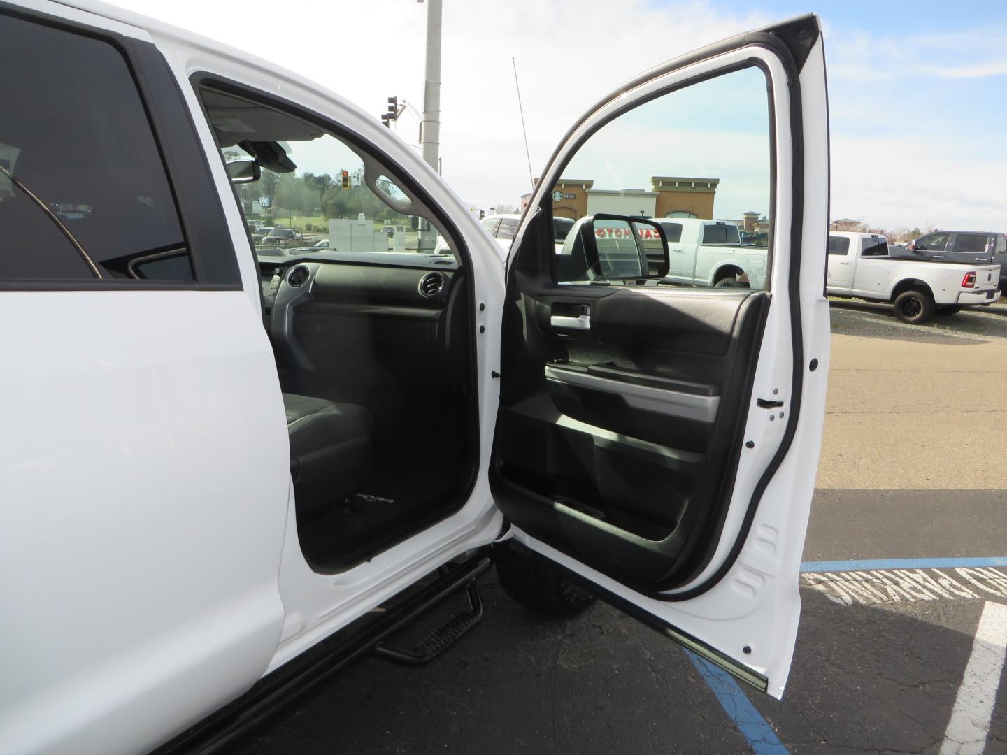 2019 White /BLACK Toyota Tundra SR5 5.7L V8 CrewMax 4WD (5TFDY5F19KX) with an 5.7L V8 DOHC 32V engine, 6A transmission, located at 2630 Grass Valley Highway, Auburn, CA, 95603, (530) 508-5100, 38.937893, -121.095482 - Clean leveled Tundra with 20" Fuel Maverick wheels, Nitto Ridge Grappler tires, N-Fab running boards, Snug Top camper shell with Yakima racks. - Photo#41